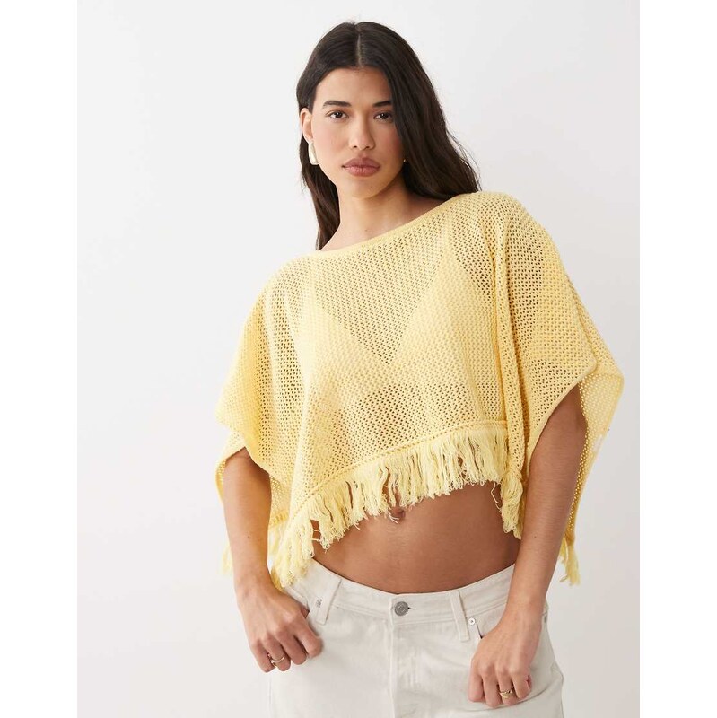 ASOS DESIGN open knit fringe cape in buttermilk-Yellow