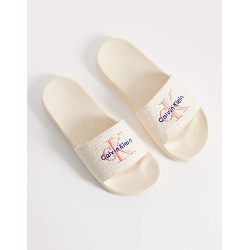 Calvin Klein Jeans essential logo slider in cream-White
