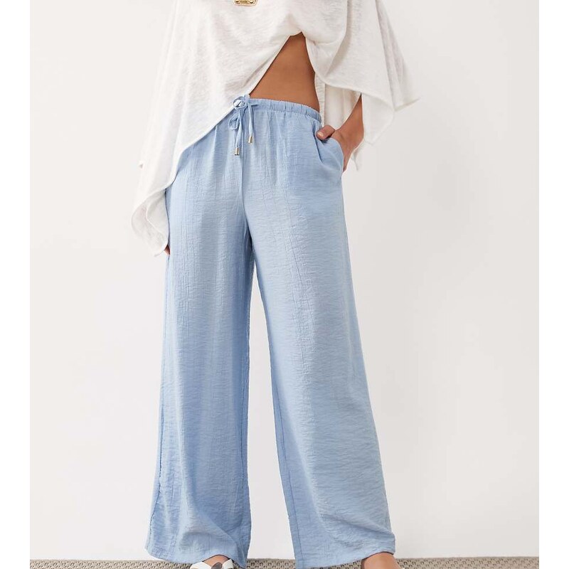 New Look Petite crinkle wide leg trousers in blue
