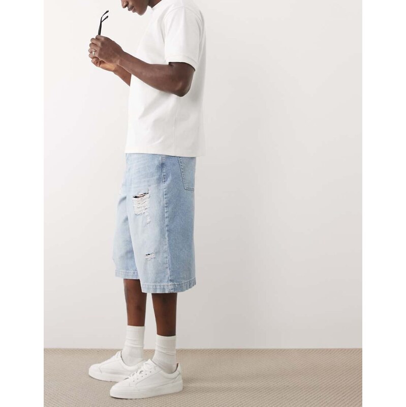 ASOS DESIGN longer length denim shorts in light wash blue with