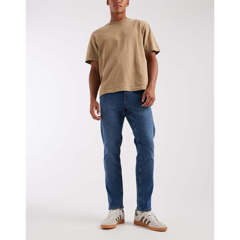 ASOS DESIGN slim jeans in mid wash blue