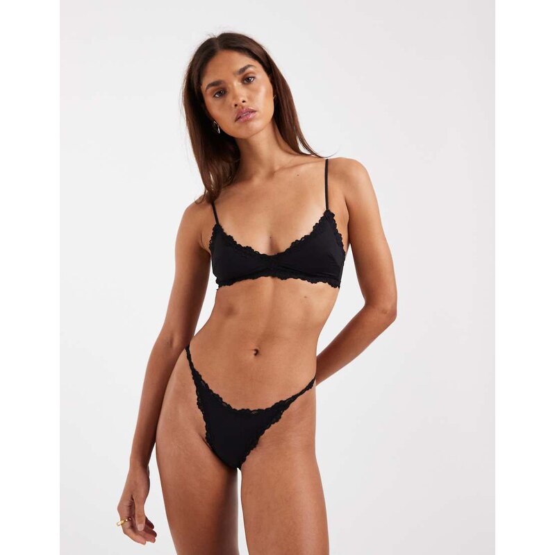Free People charlie micro thong in black 115057930