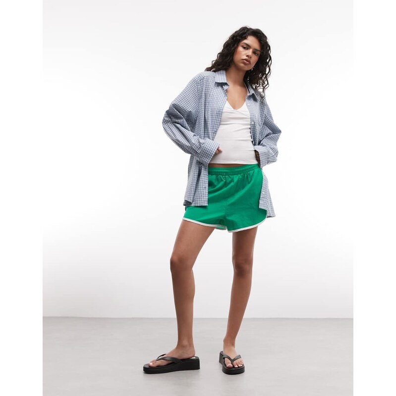 COLLUSION dolphin hem runner short-Green