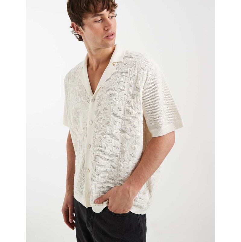 ASOS DESIGN relaxed knitted button through polo in floral texture-White