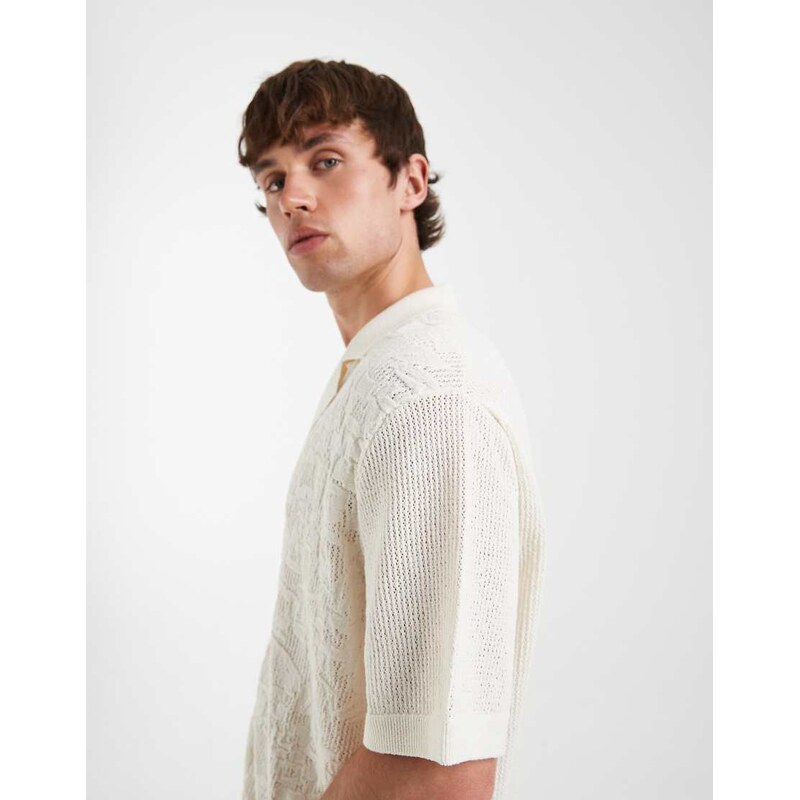 ASOS DESIGN relaxed knitted button through polo in floral texture-White