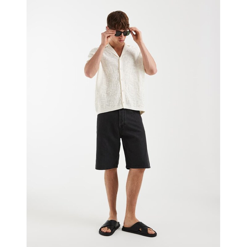 ASOS DESIGN relaxed knitted button through polo in floral texture-White