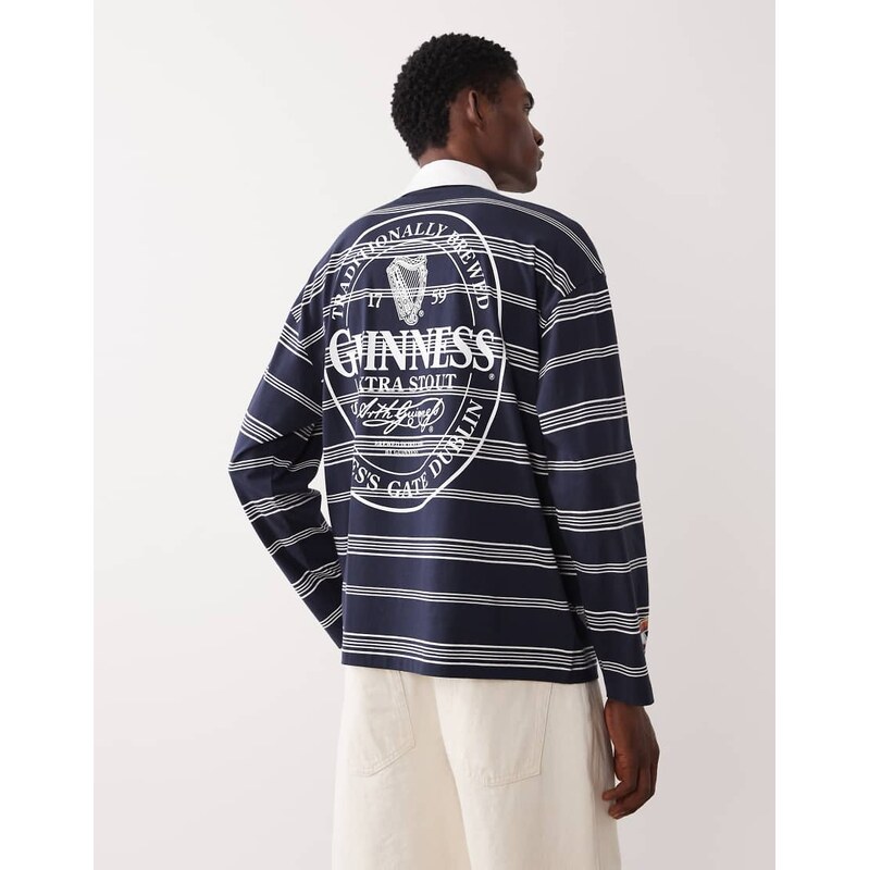ASOS DESIGN relaxed polo with Guinness print in Navy