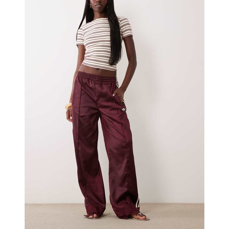 adidas Originals satin firebird track pants with lace hem in