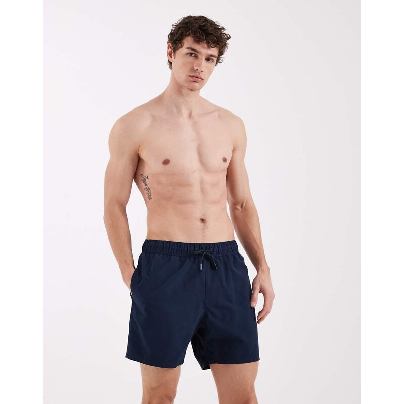 ASOS DESIGN swim shorts in mid length in navy