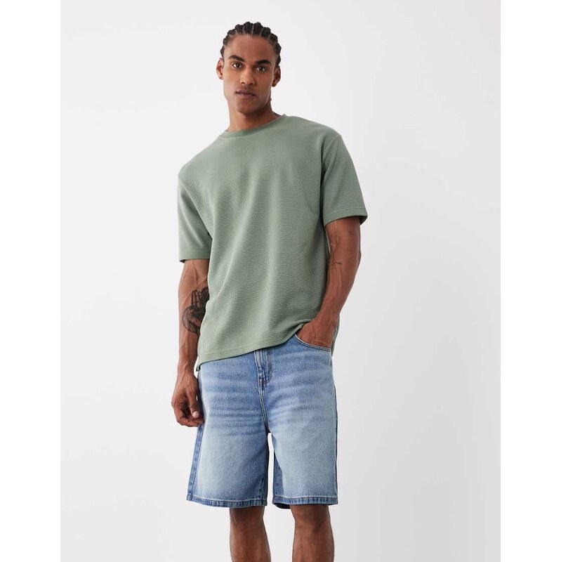 ASOS DESIGN mid length denim jorts in light washed blue