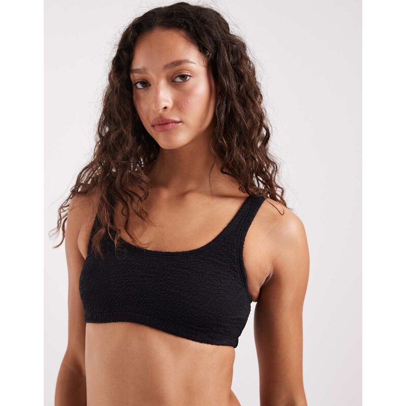 Nike Swimming Nike bralette bikini top in black 115079141