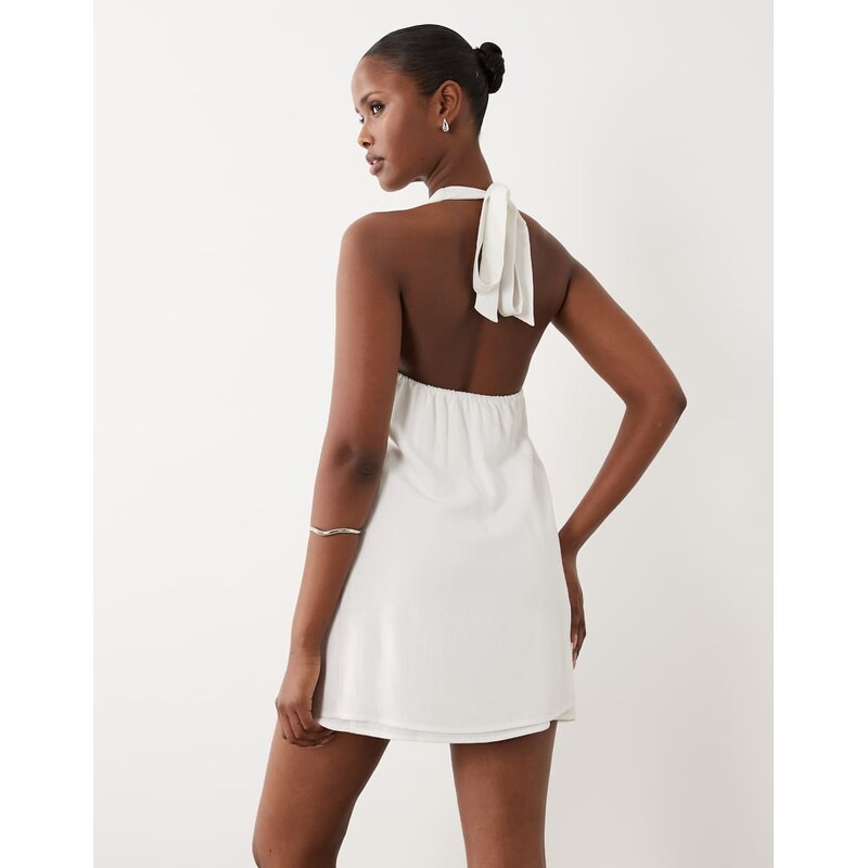 The Frolic exclusive linen halterneck mini dress in white