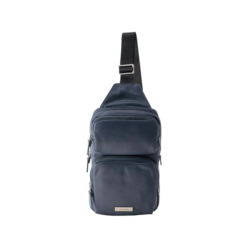 Calvin Klein Taška přes rameno Sling safírová
