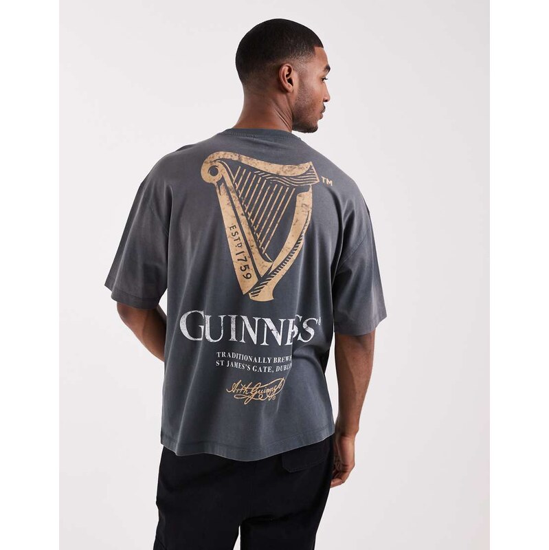 ASOS DESIGN oversized tee with Guinness print in washed black