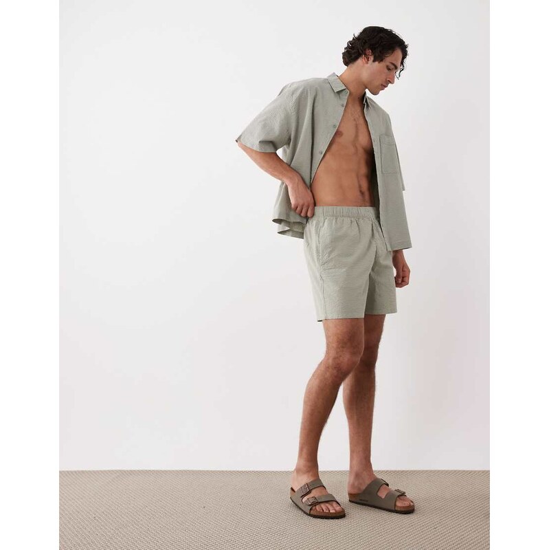 ASOS DESIGN co-ord seersucker mid length shorts in sage green