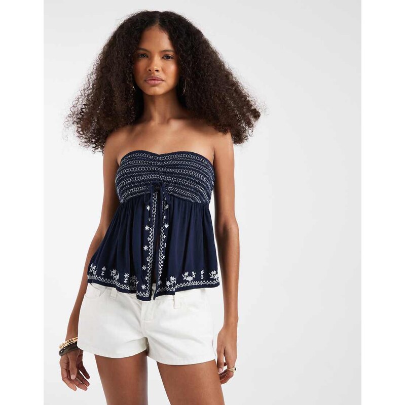 Hollister babydoll bandeau top wtih embroidered hem in navy