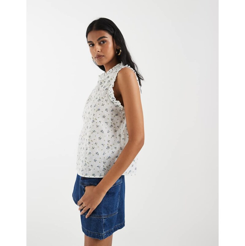 Vero Moda dobby texture ruffle trim sleeveless top in white and blue 115227307