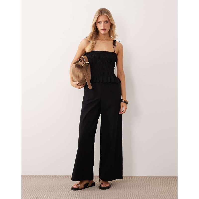 ASOS DESIGN shirred peplum jumpsuit in black