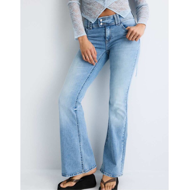 Stradivarius Embroidered bell bottom jeans in medium light blue