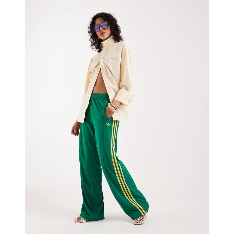 adidas Originals Firebird loose track pants in green and yellow