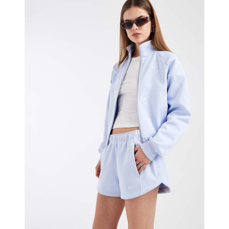 Nike windrunner woven 2 inch shorts in light blue 115715542