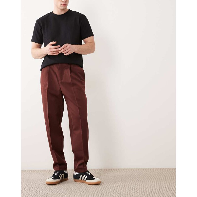 ASOS DESIGN tailored pleated relaxed tapered trousers in