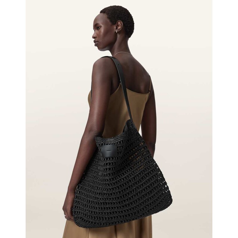 AllSaints Asha woven straw mesh shoulder bag in black 115535887