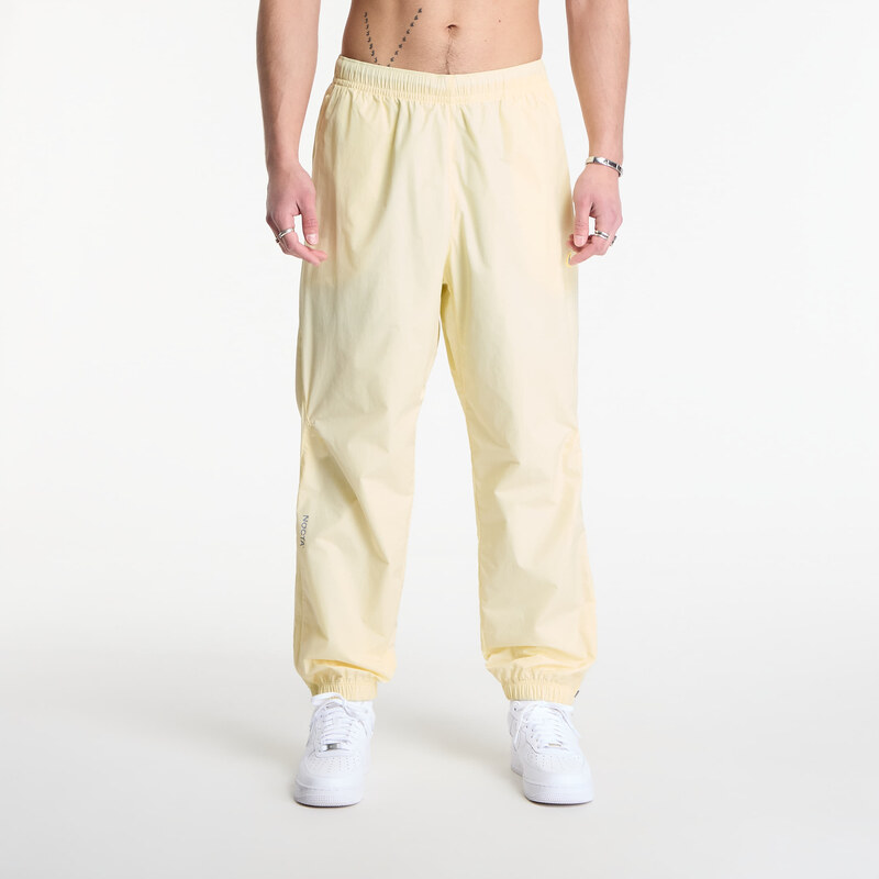 Kalhoty Nike x NOCTA Northstar Nylon Track Pants Alabaster/
