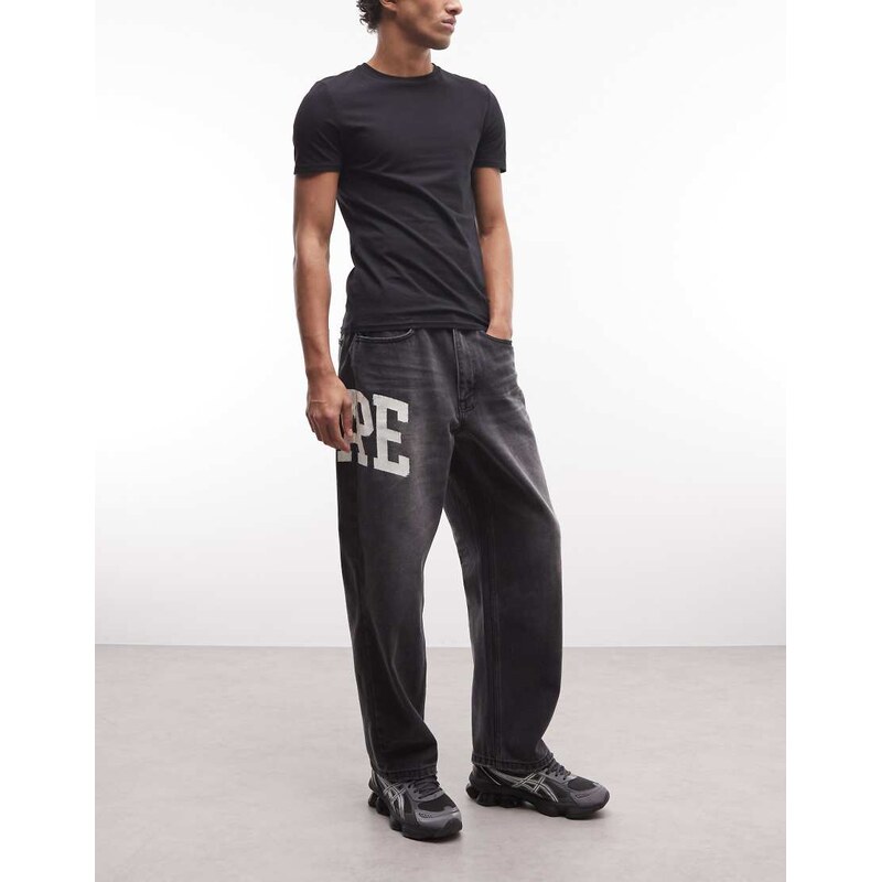 Aape by A Bathing Ape loose fit denim jeans in washed black with logo 115188501