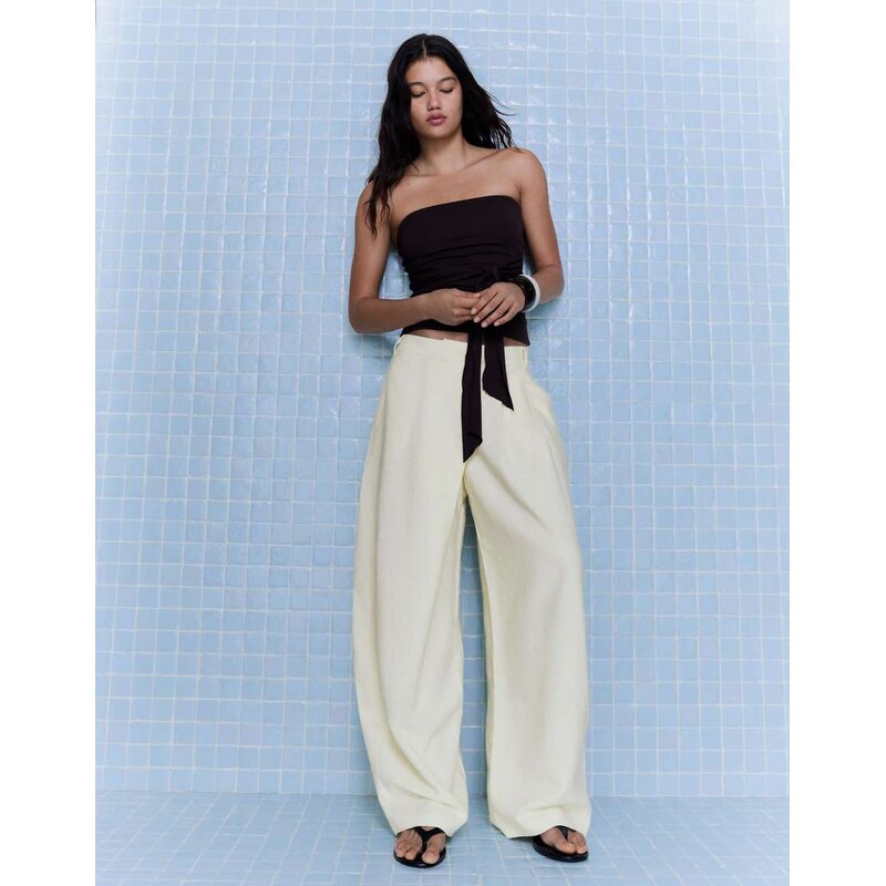 Bershka Crossover waist loose-fitting trousers in yellow