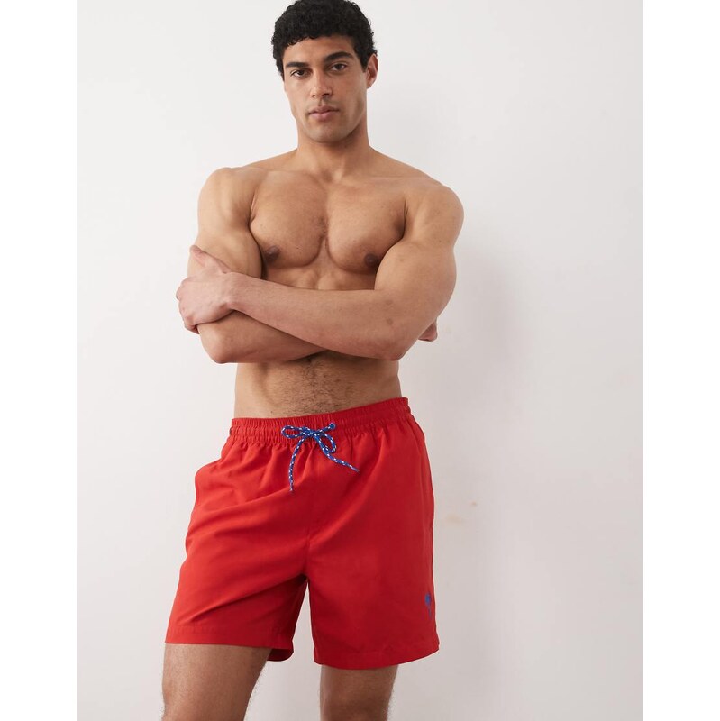 Threadbare swim shorts with palm tree graphic in red