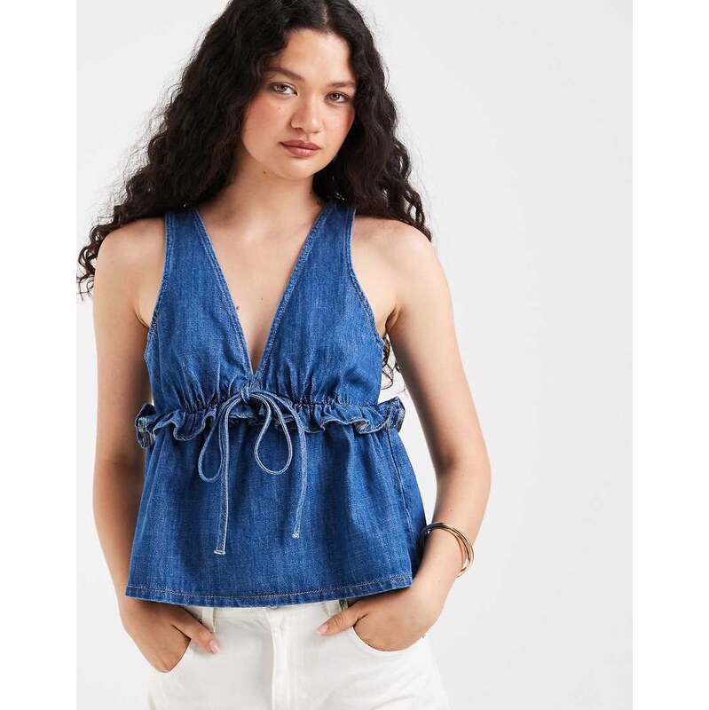 ASOS DESIGN denim plunge swing top in mid blue