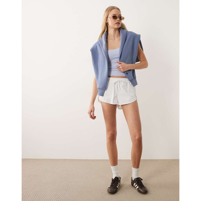 Cotton On Active dolphin hem shorts in white