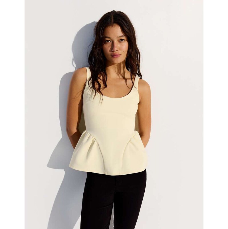Bershka Peplum strappy top in yellow 115388881