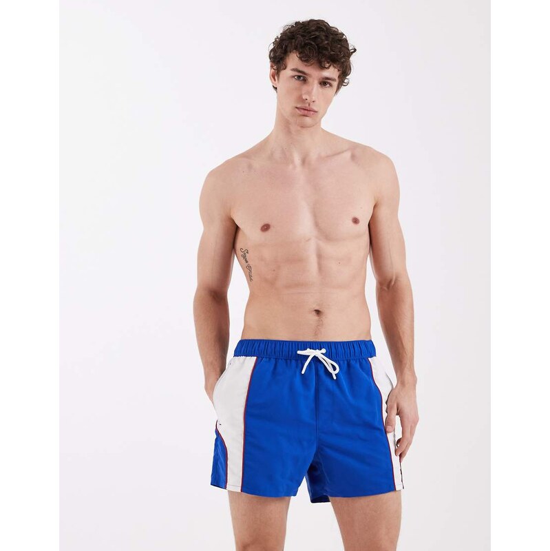ASOS DESIGN swim shorts in short length with sporty panelling in blue