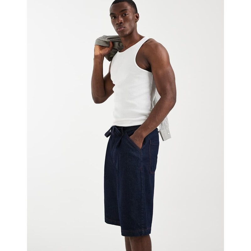 ASOS DESIGN loose denim jorts in raw indigo with contrast stitch