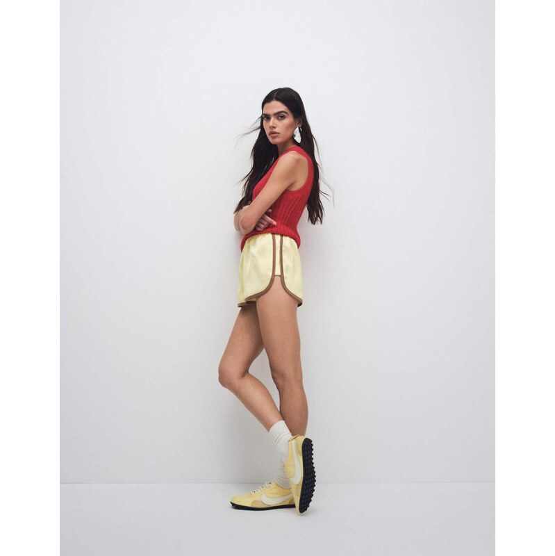 ASOS DESIGN contrast seam satin runner short in yellow and mocha