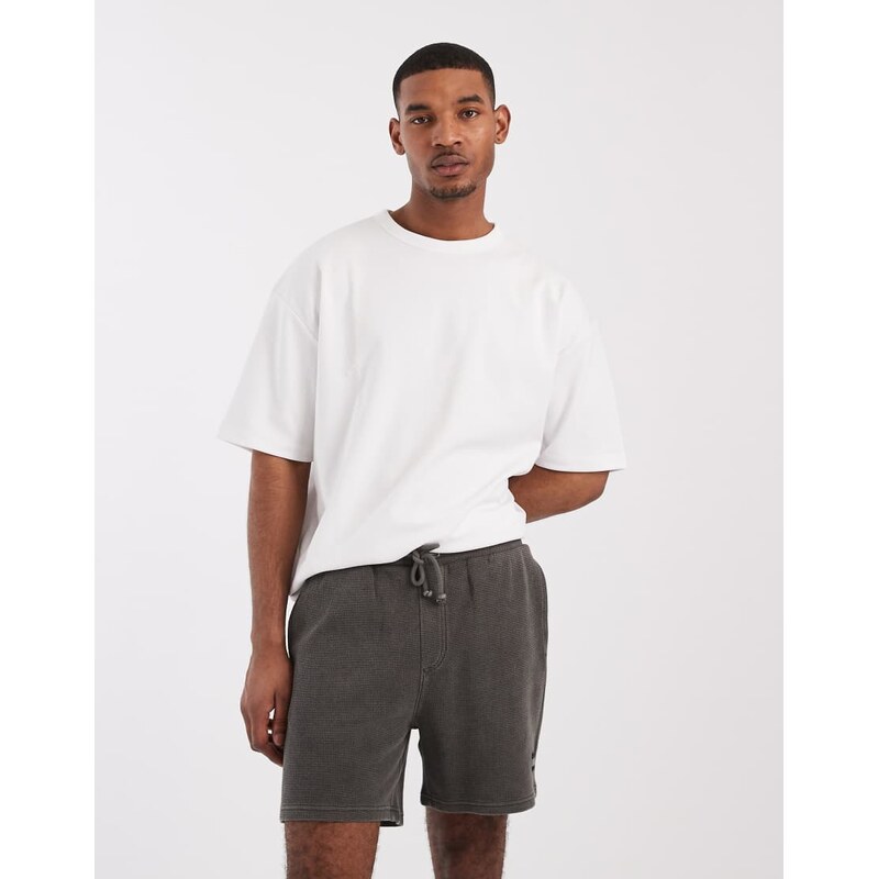 Tommy Jeans flag logo shorts in washed black