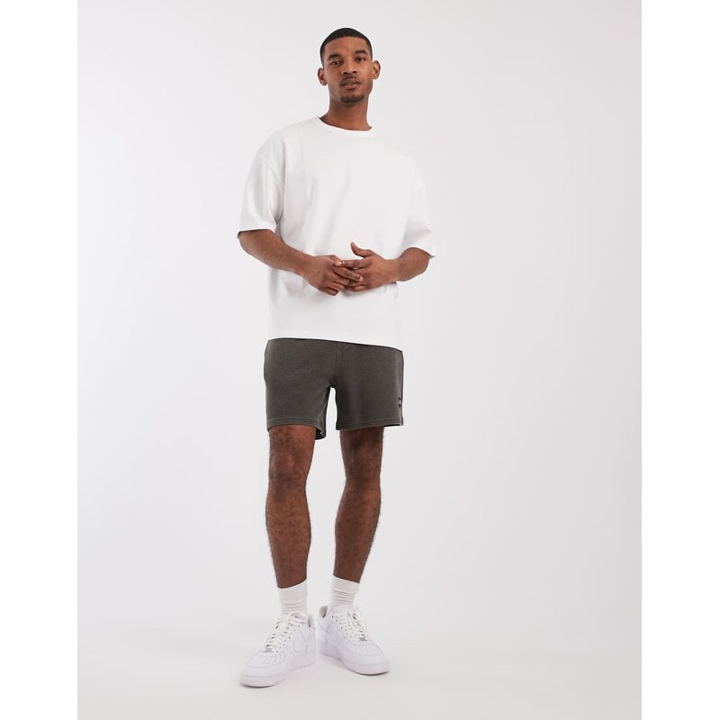 Tommy Jeans flag logo shorts in washed black