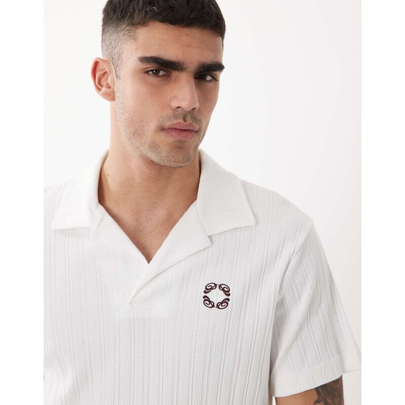 ASOS DESIGN super heavyweight regular fit polo with chest graphic in white rib fabric