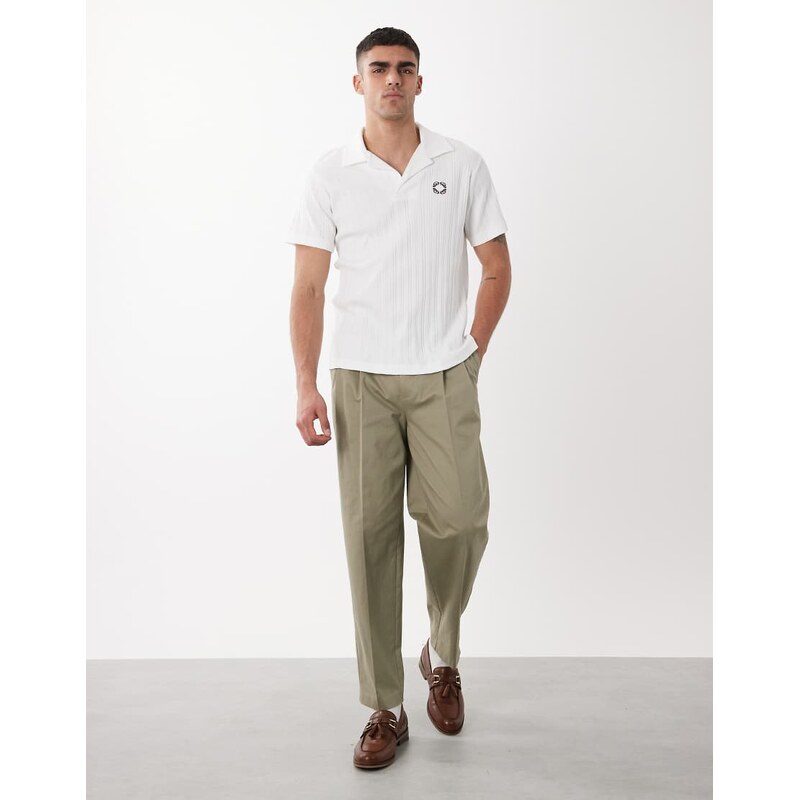 ASOS DESIGN super heavyweight regular fit polo with chest graphic in white rib fabric
