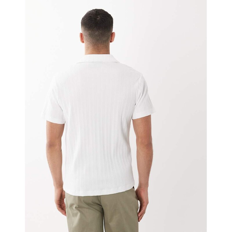 ASOS DESIGN super heavyweight regular fit polo with chest graphic in white rib fabric