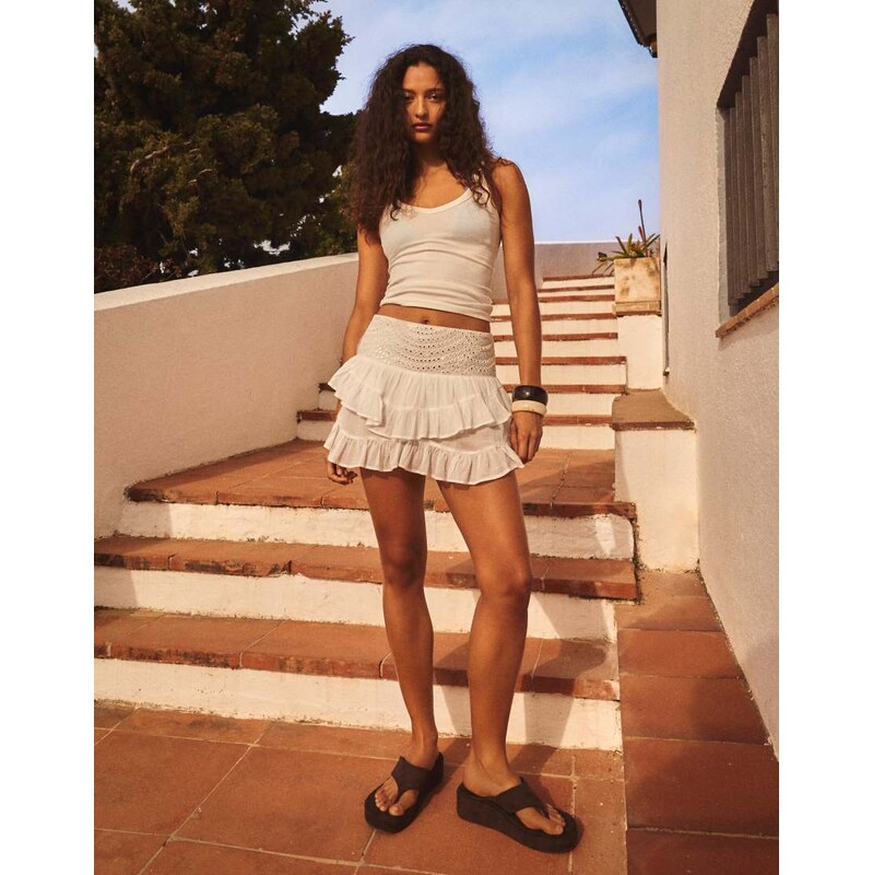 Bershka Shimmery ruffled mini skirt in white 115496837