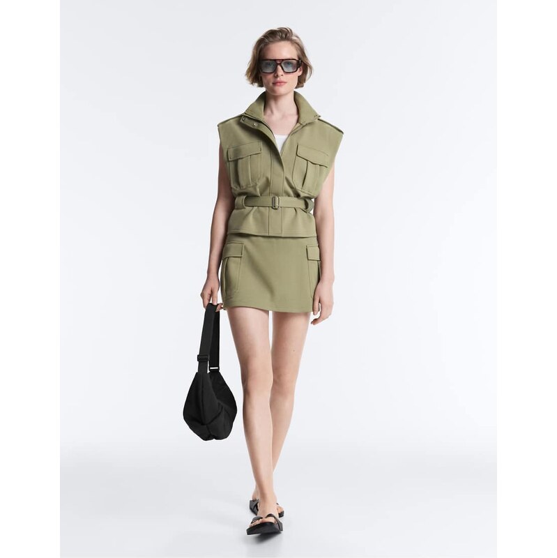 OYSHO Short piqué skirt with cotton pockets in yellow green