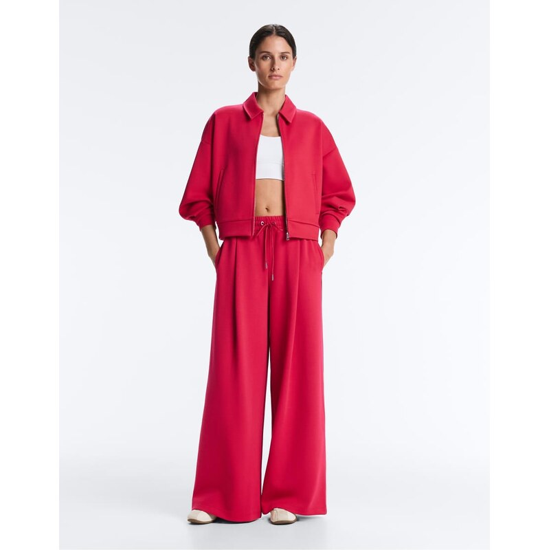 OYSHO Wide-leg piqué pleat trousers with cotton in red 115496988