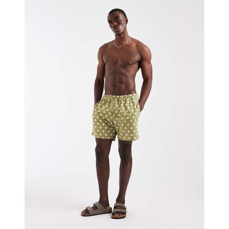 ASOS DESIGN swim shorts in mid length in green print