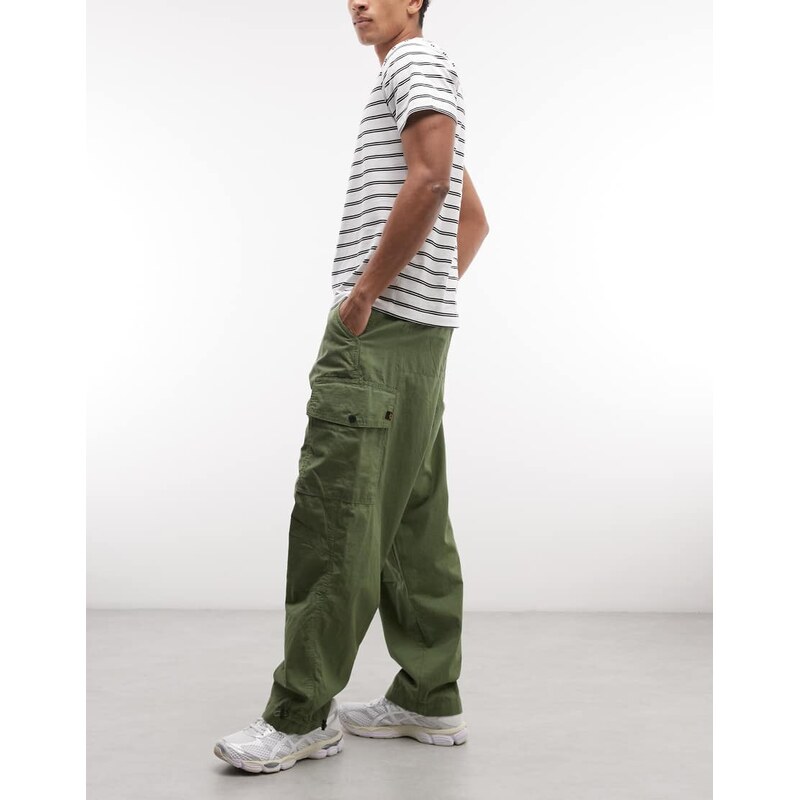 Alpha Industries cargo trousers with adjustable leg toggles in khaki-Green