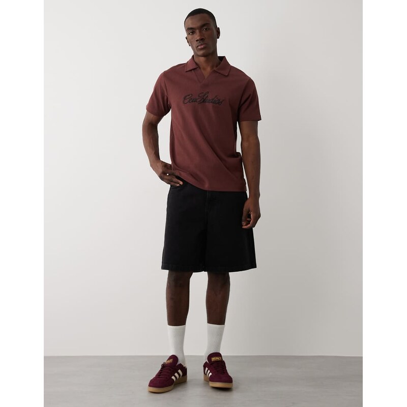ASOS DESIGN super heavyweight regular fit polo with text graphic in brown rib fabric