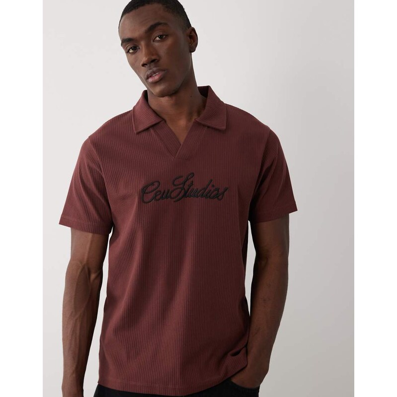 ASOS DESIGN super heavyweight regular fit polo with text graphic in brown rib fabric