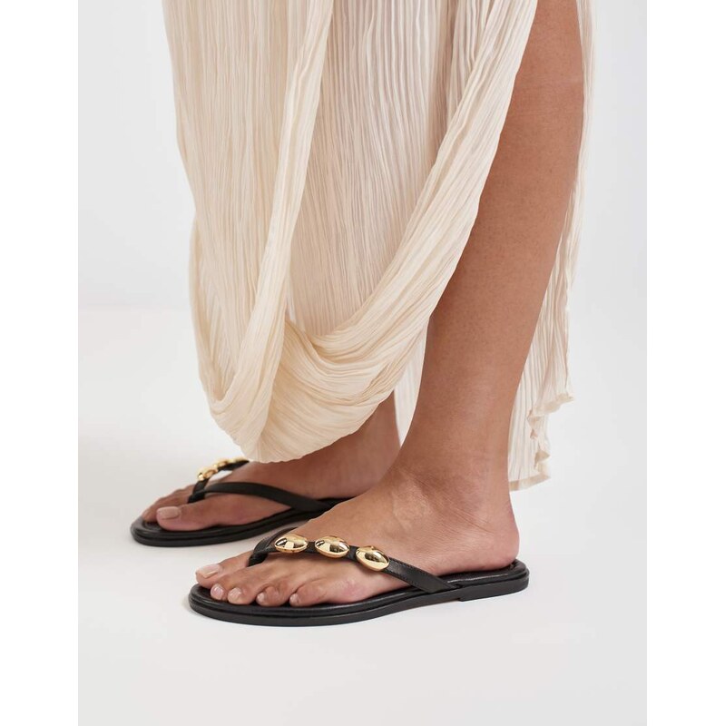 Dolce Vita Juny tong sandals with gold detail in black leather 115499585
